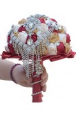 Champagne,Rose Red and ivory bride holding flowers